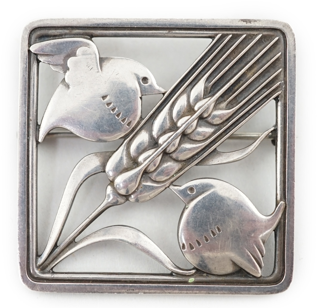 A Georg Jensen silver 'wheatsheaf and robin' brooch, design no. 250